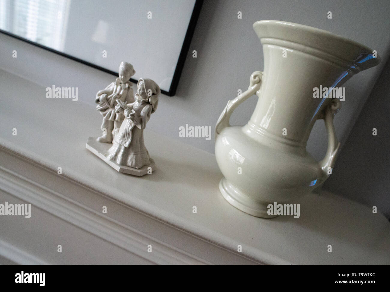 Vase And Figurines On Fireplace Mantel Stock Photo 247045216 Alamy