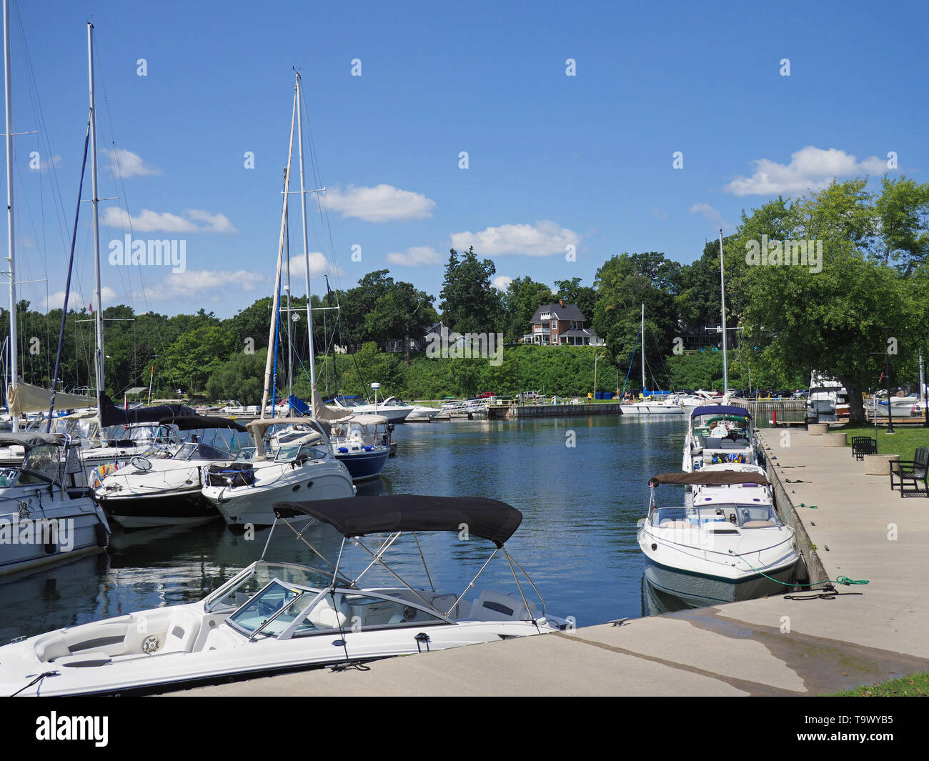 pleasure boats in a marina in the Thousand Islands region Stock Photo