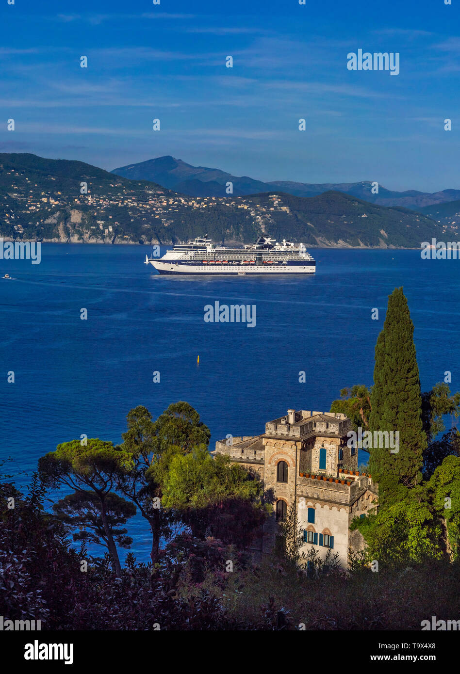 Cross driving ship celebrity Constellation and the museum of Castello Brown in Portofino, province Genoa, Riviera Tu the Levant, Liguria, Italy, Europ Stock Photo