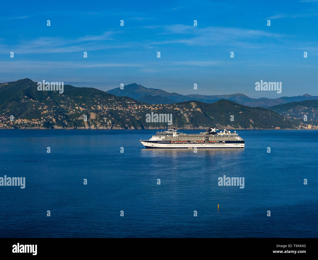 Cross driving ship celebrity Constellation with Portofino, province Genoa, Riviera Tu the Levant, Liguria, Italy, Europe, Kreuzfahrschiff Celebrity Co Stock Photo