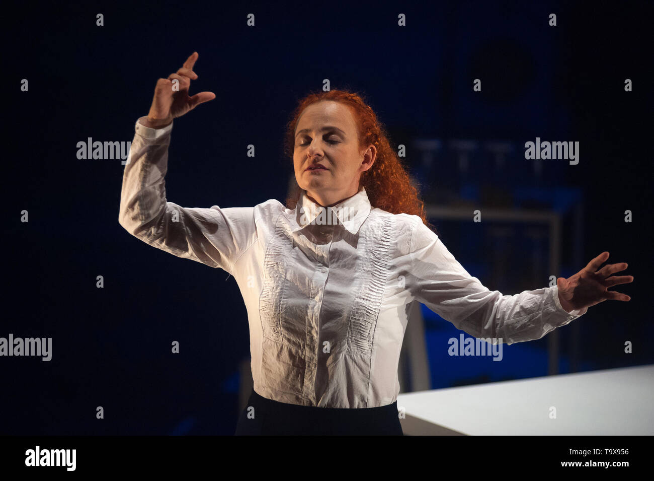 An actress seen on the stage performing during a general rehearsal of 'Multiple' at theatre Echegaray, directed by Julio Fraga with text of Spanish journalist Marga Dorao. 'Multiple' is about a love, lack of freedom and fundamentalism story based in poligamous relationships between Alma (a woman that cannot have children), Bárbara and their husband Jacob. Stock Photo