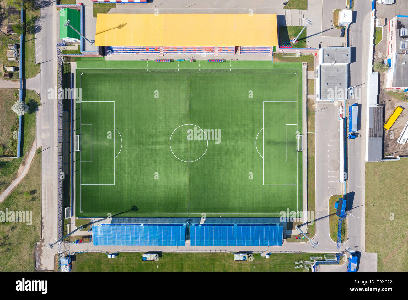 empty soccer stadium green field. football field from above. aerial top