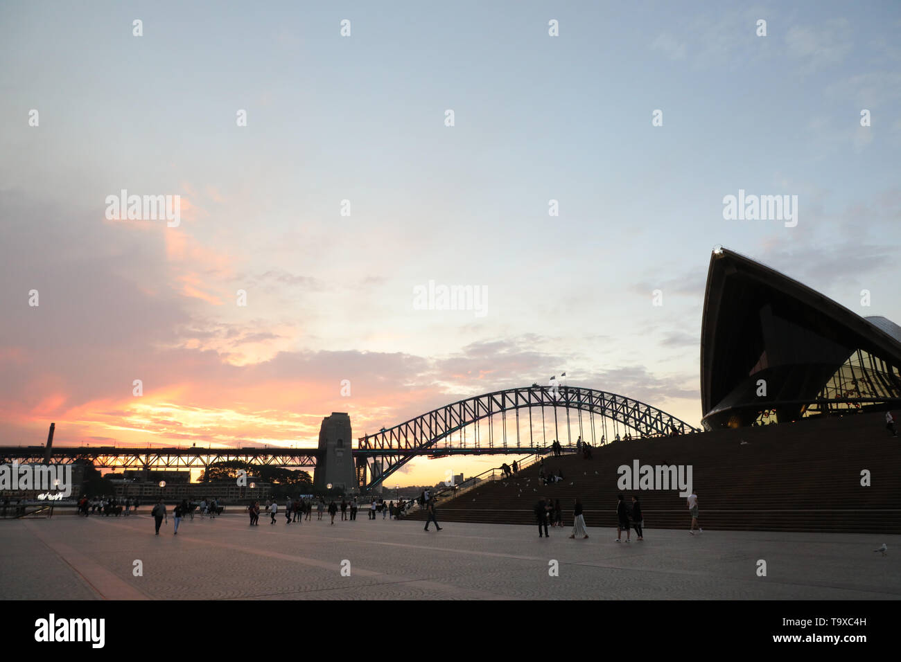Sunset looking towards the Sydney Harbour Bridge and Opera House from ...