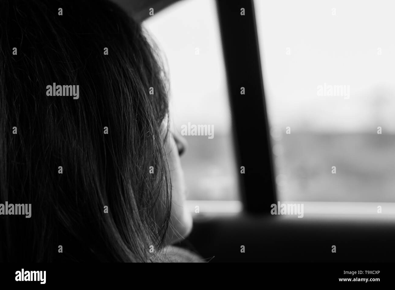 Relaxing while driving in a car Stock Photo Alamy