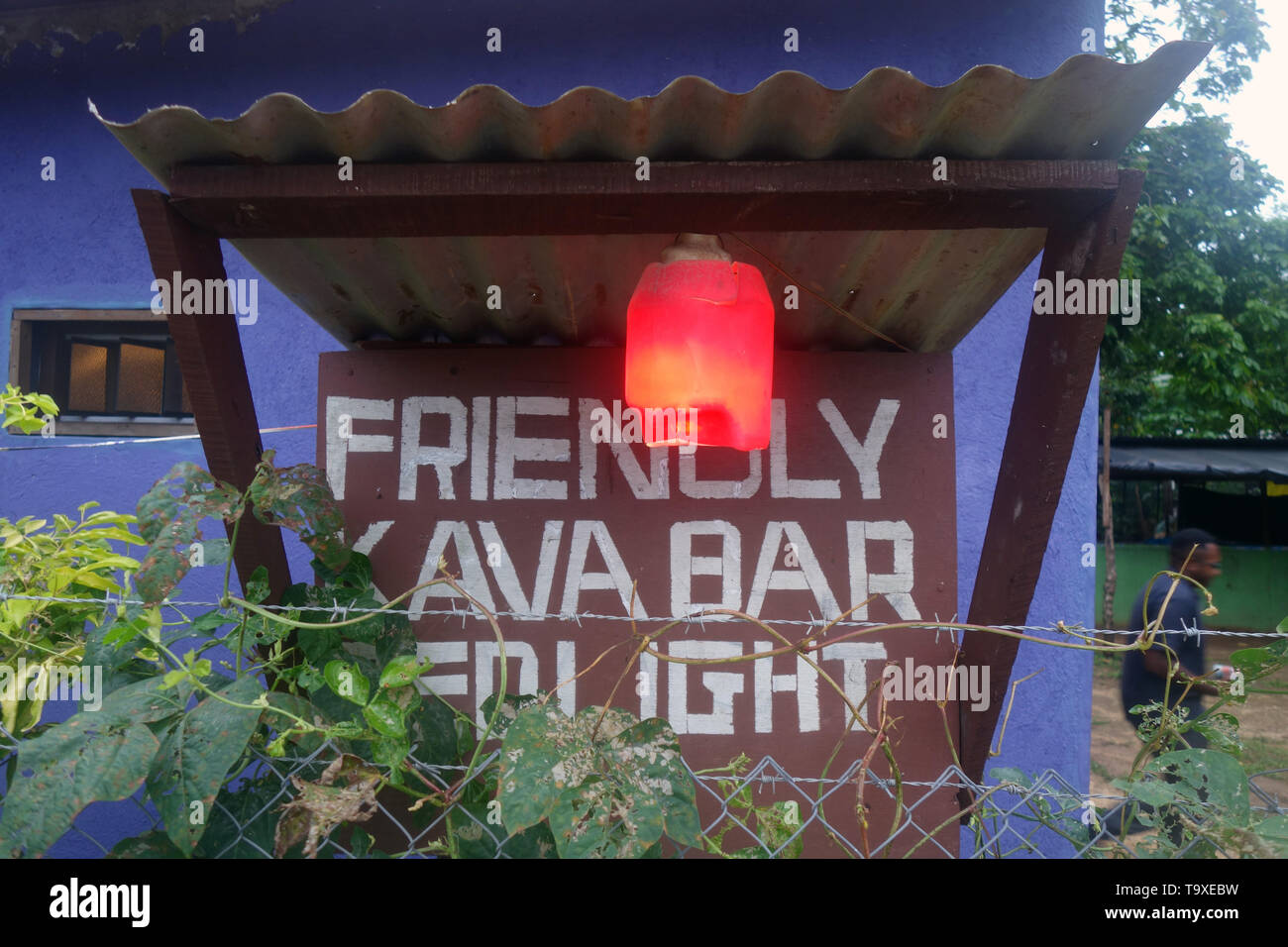 Sign for Friendly Kava Bar (red light), Luganville, Espiritu Santo, Vanuatu. No MR or PR Stock Photo
