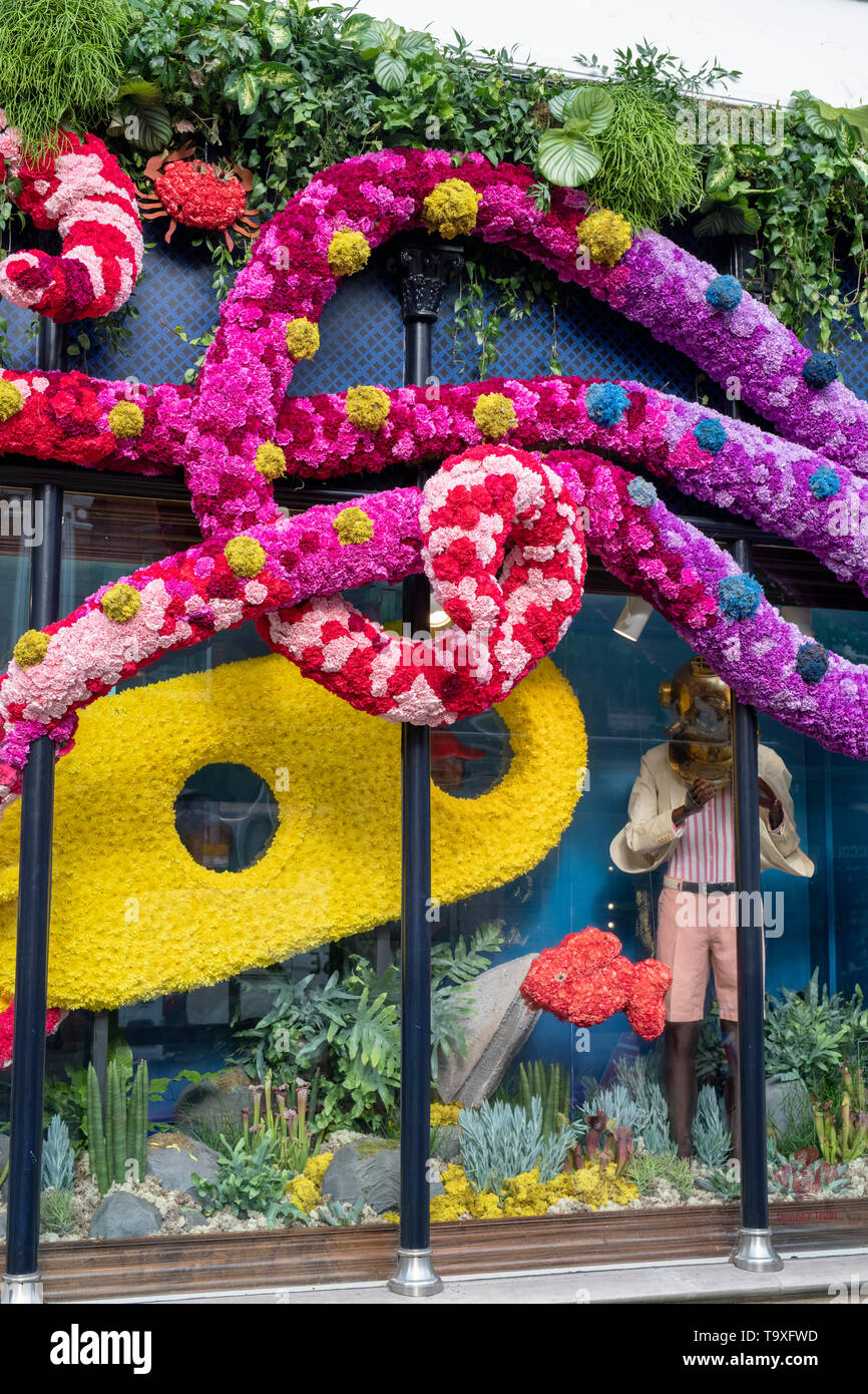 Floral display outside Hackett shop in Sloane Street for Chelsea in Bloom 2019. Chelsea, London, England Stock Photo