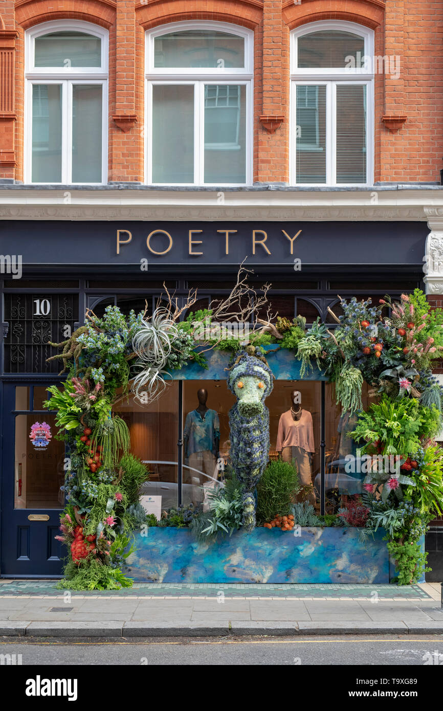 Poetry shop  floral display in Symons Street for Chelsea in Bloom 2019. Chelsea, London, England Stock Photo