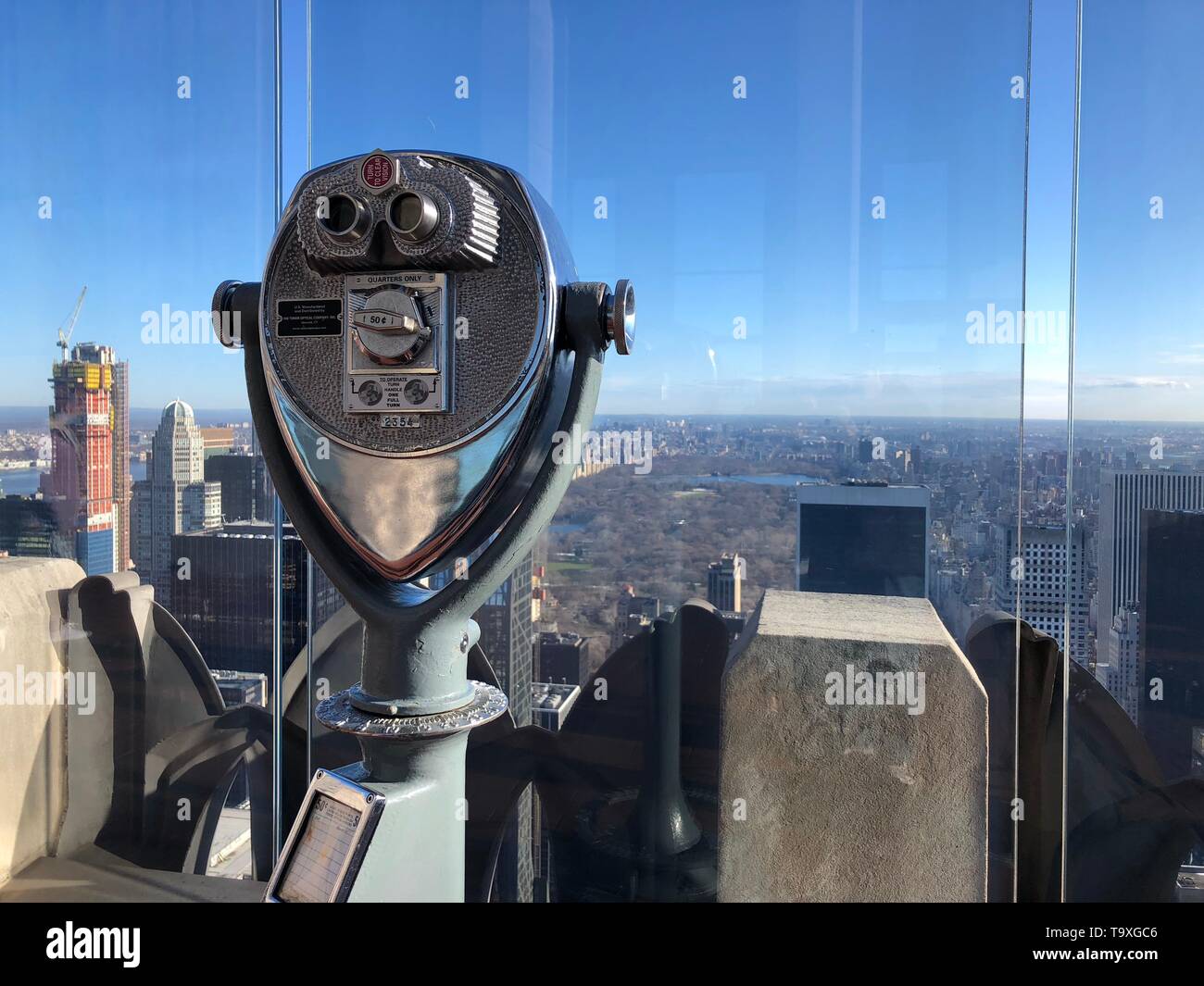 Coin Operated Binoculars on top of a building in New York City Stock Photo