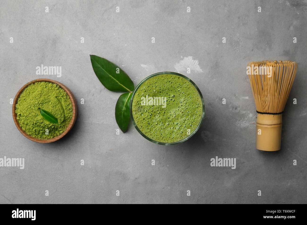 Composition with matcha tea on grey background Stock Photo