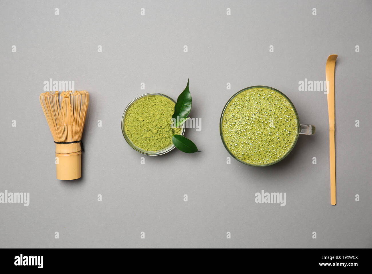 Composition with matcha tea on grey background Stock Photo