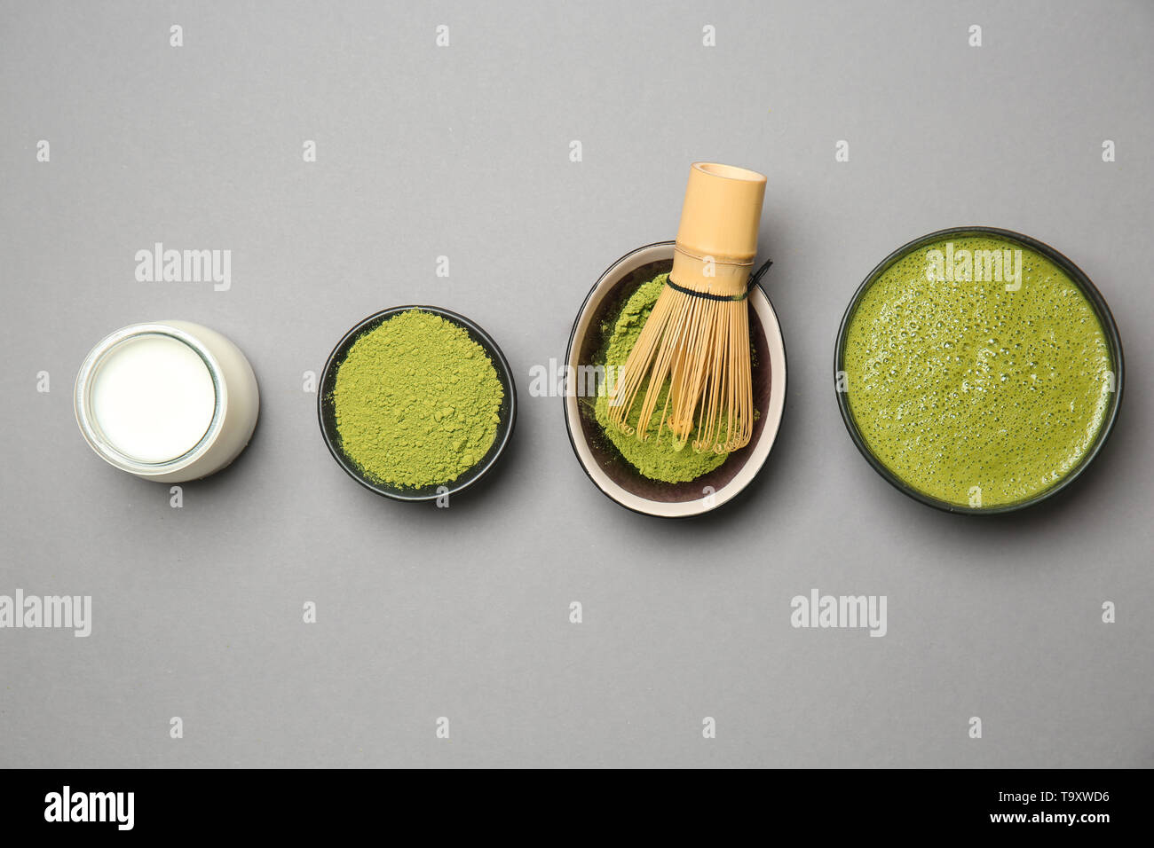 Composition with matcha tea on grey background Stock Photo