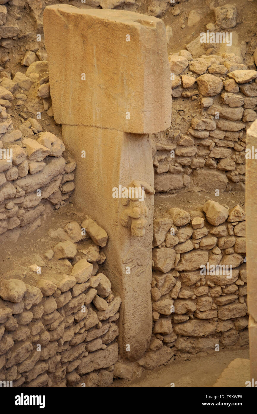 Ancient ruins with carved animals in stone at Gobekli Tepe, Sanliurfa, Turkey Stock Photo