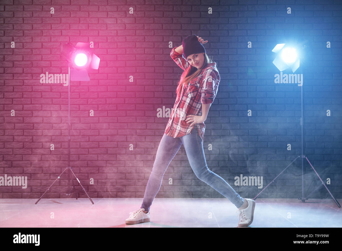 Stylish young woman dancing hip hi-res stock photography and images - Alamy