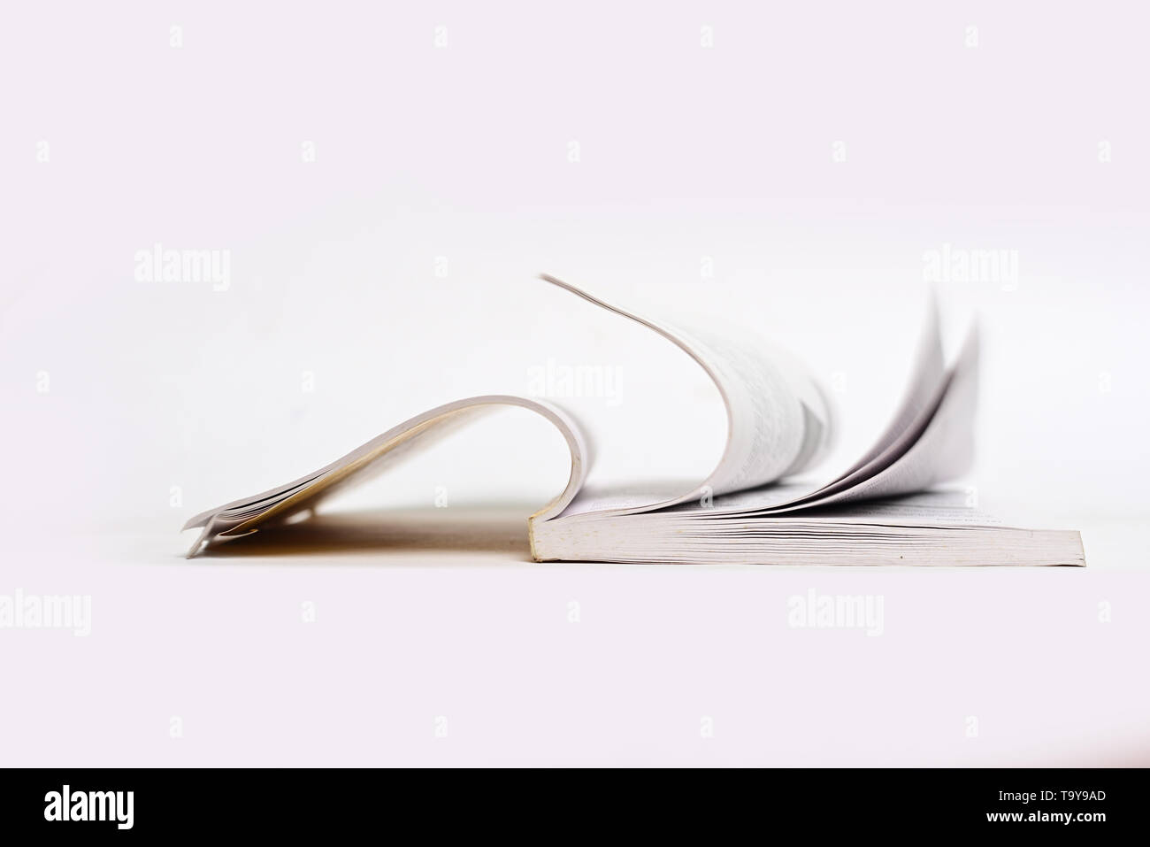 open book isolated on white background Stock Photo - Alamy
