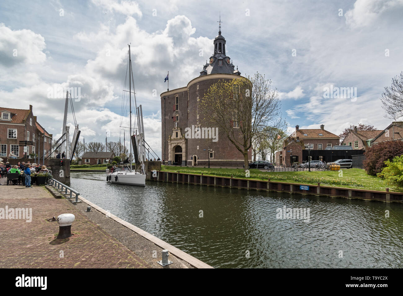 old harbour of Enkhuizen with the former town gate building the dromedaris Stock Photo