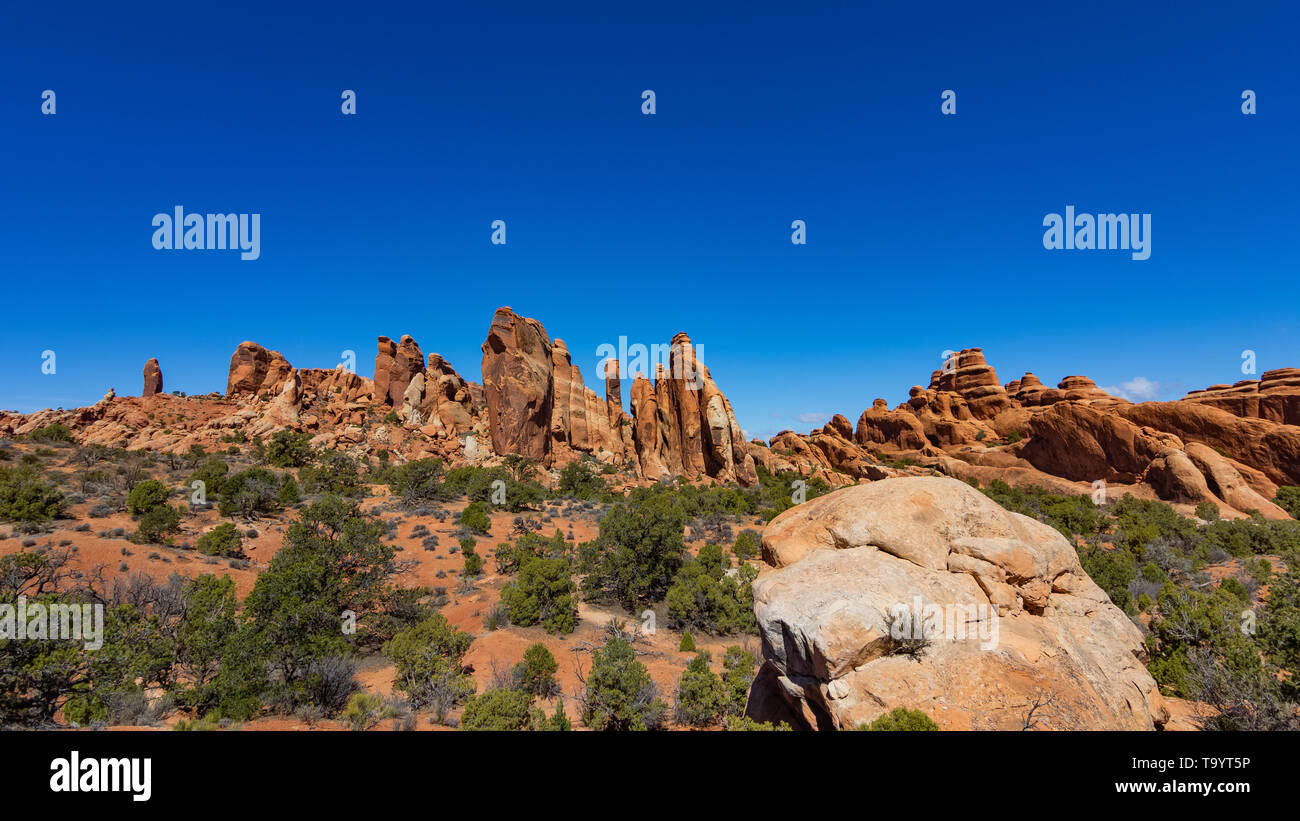 towers of stone carved by water and wind in arches national park Stock Photo