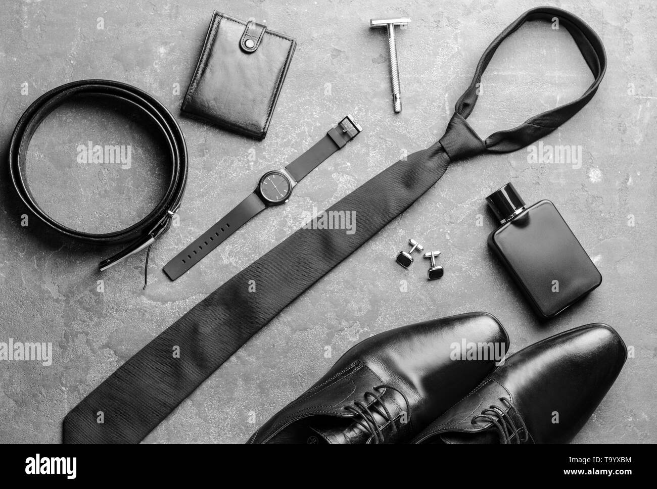 Stylish male accessories on grey background Stock Photo - Alamy