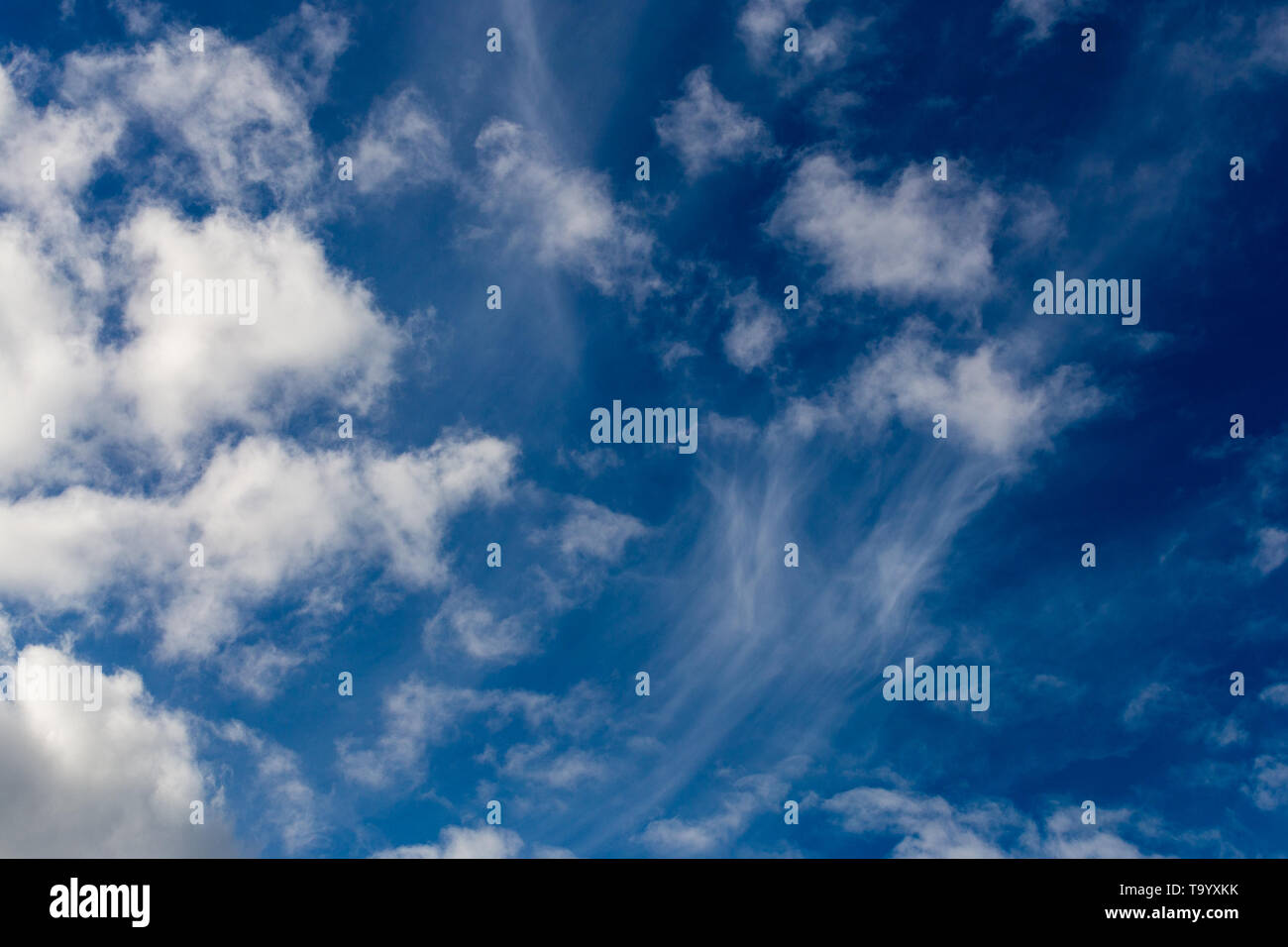 mixed clouds closeup telephoto shot with polarizing effect Stock Photo
