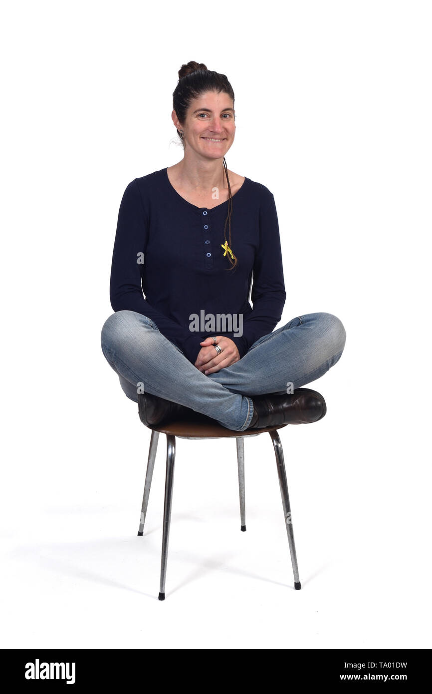 woman sitting in a vintage chair with the lotus pose Stock Photo Alamy