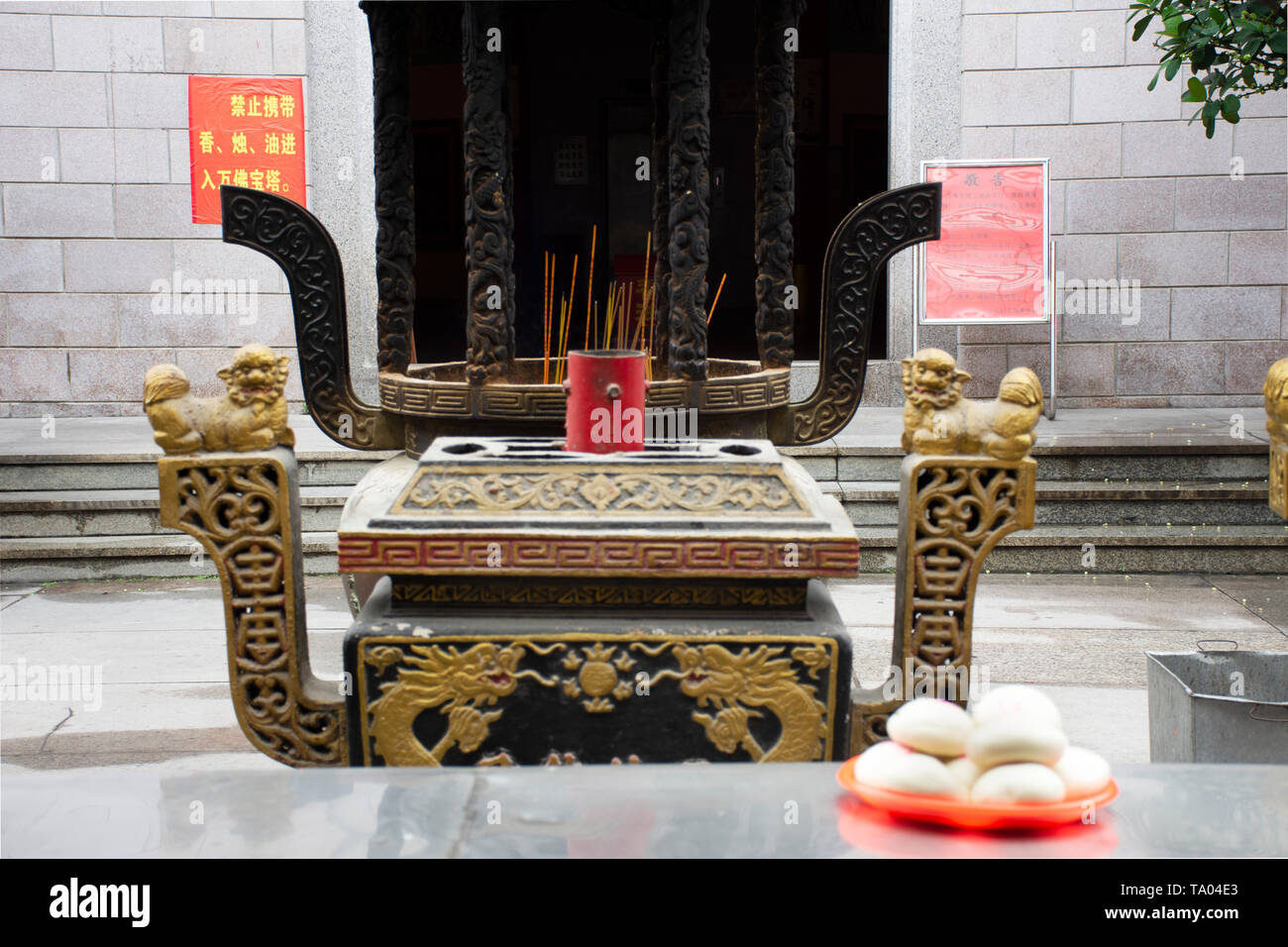People use chinese steamed bread buns or Mantou sacrificial offering food for pray god and memorial to ancestor in Tiantan temple at Shantou or Swatow Stock Photo