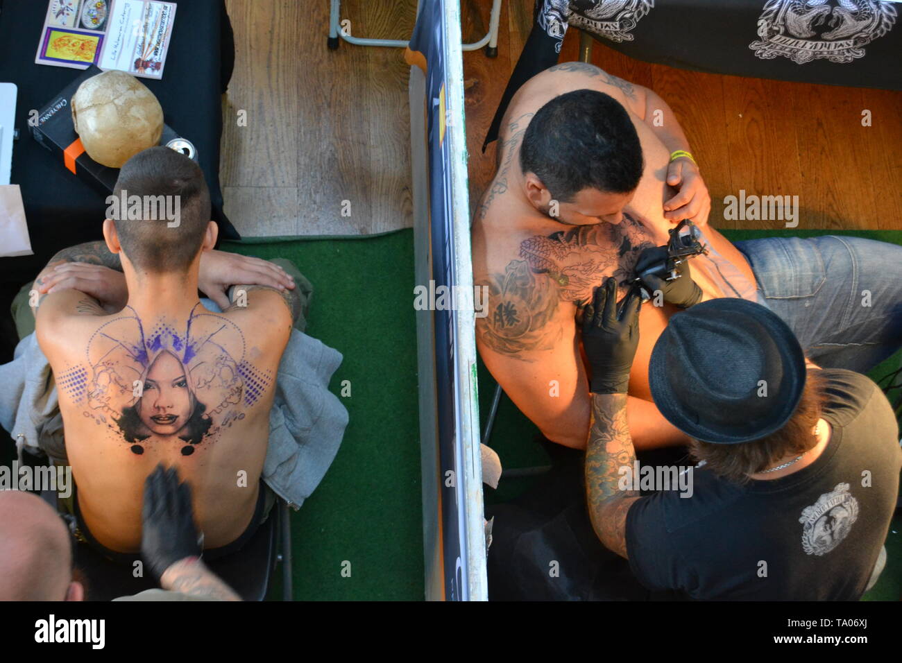 Live tattooing at a Tattoo convention in Stockholm Stock Photo