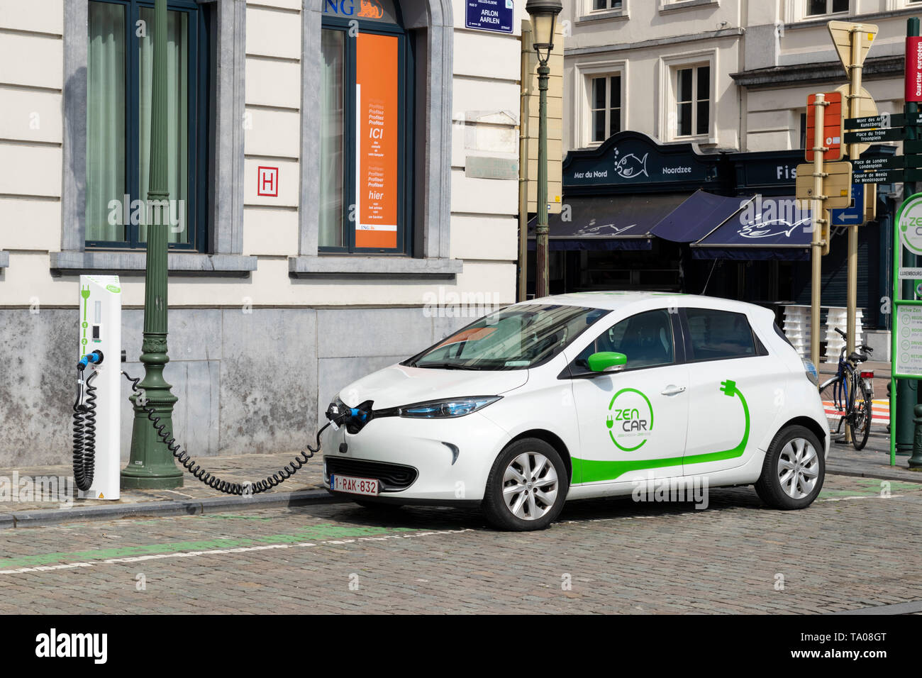 ZEN car ,car share, ZENCAR Renault ZOE Electric car charging in the street Rue d'Arlon,Brussels,Belgium,Eu, Europe Stock Photo