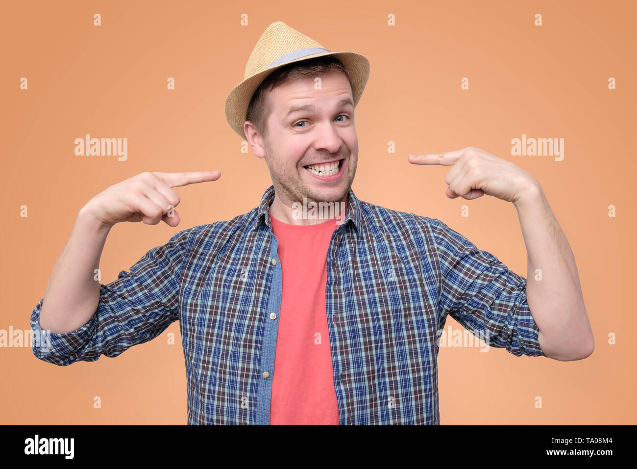 Shows a man with a hat hi-res stock photography and images - Alamy