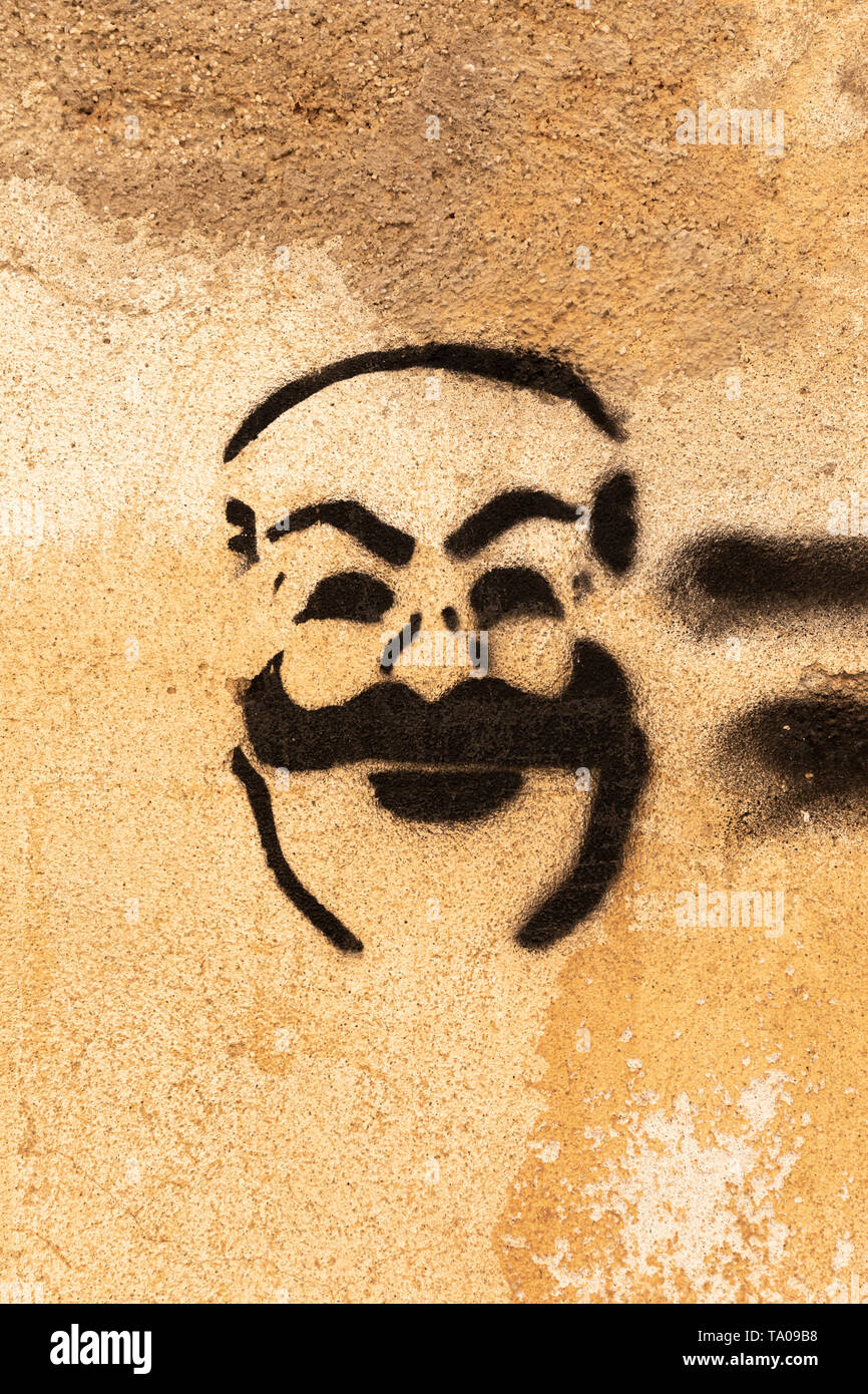 Graffiti on the walls in the back streets and alleyways of Pisa Stock Photo