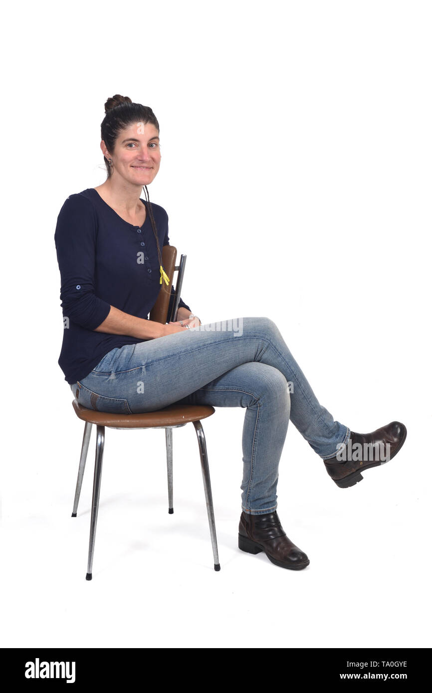 Girl Sit On Stool Tuck Legs Up. Picture Image: 18313341