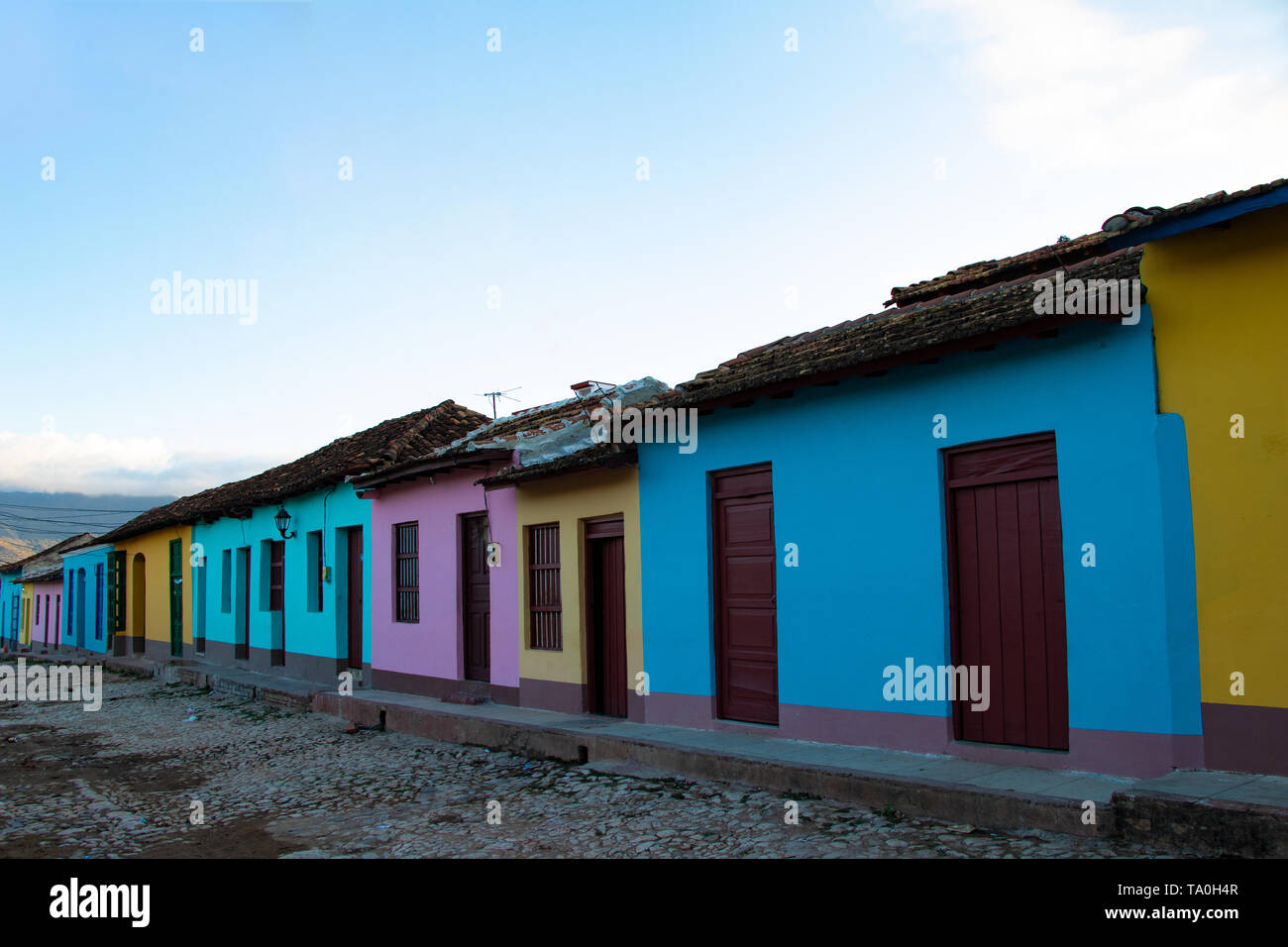 Street view of colored houses in old town of Trinidad, Cuba Stock Photo