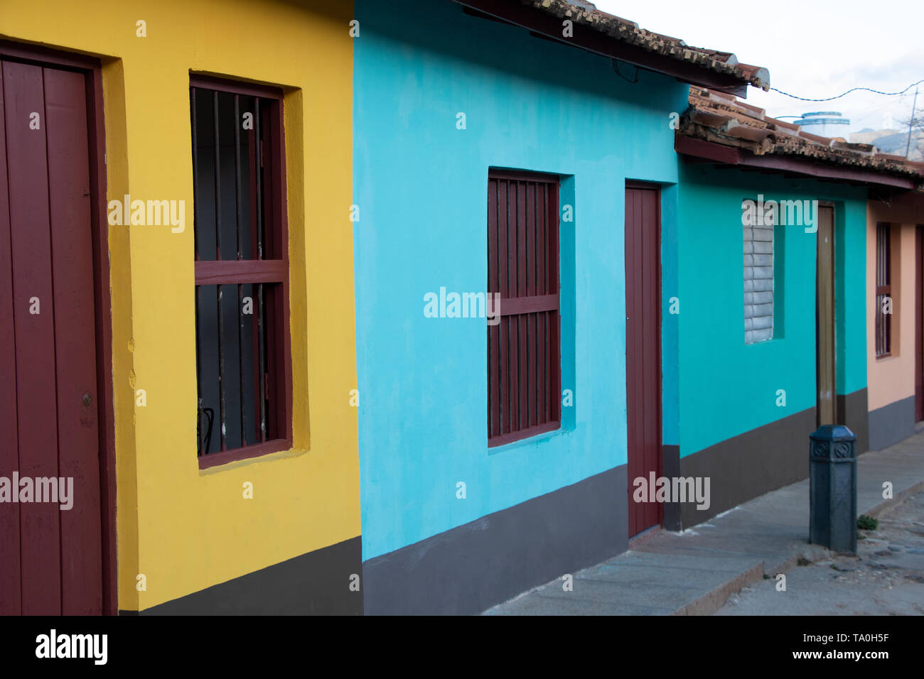 Street view of colored houses in old town of Trinidad, Cuba Stock Photo