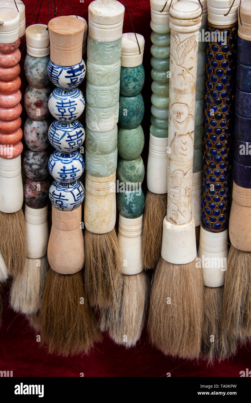 Singapore, Chinatown. Detail of typical onion brush souvenirs Stock
