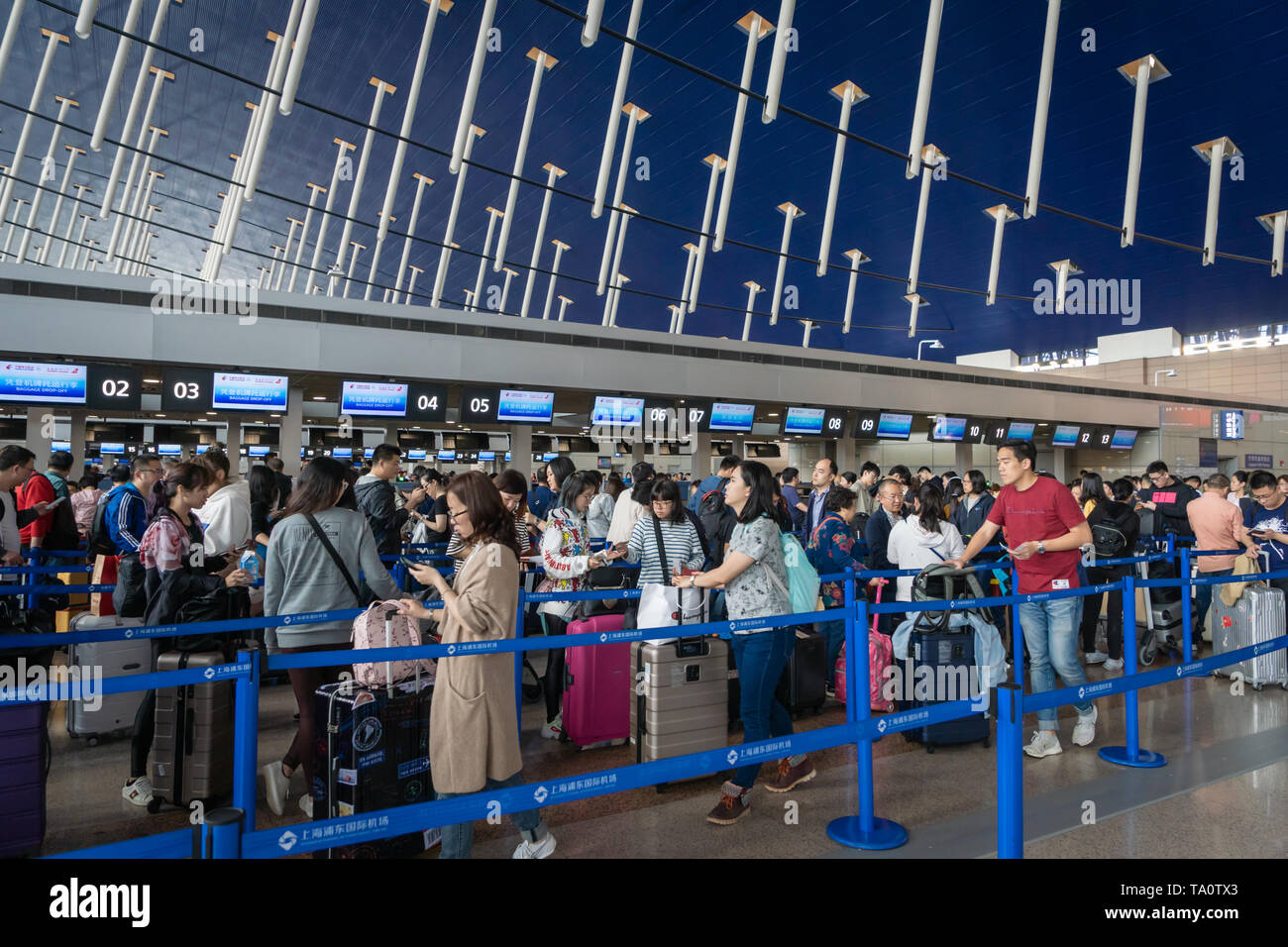 Chinese waiting at airport hi-res stock photography and images - Alamy
