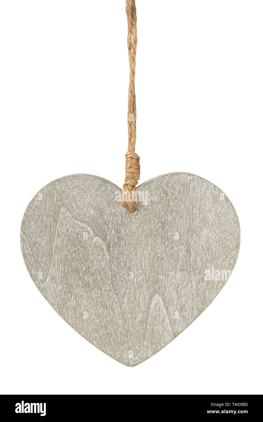 Wooden heart with string on white background Stock Photo