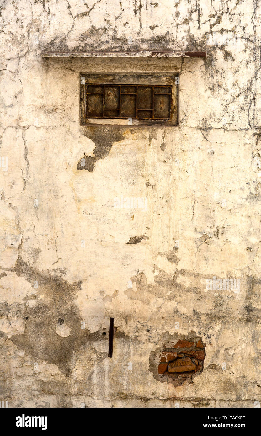 Old scary brick wall in india Stock Photo