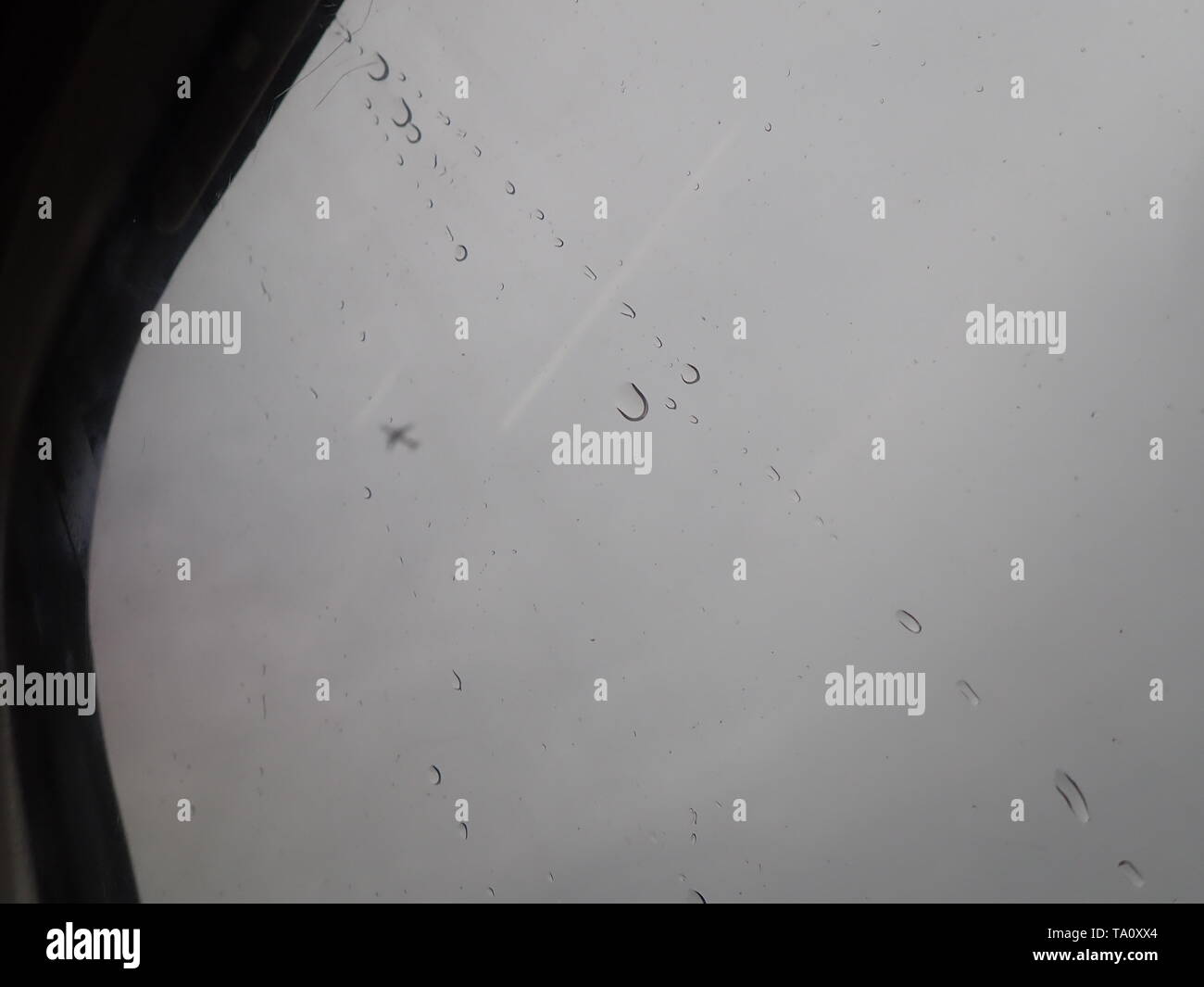 Car window with rain streaks Stock Photo Alamy