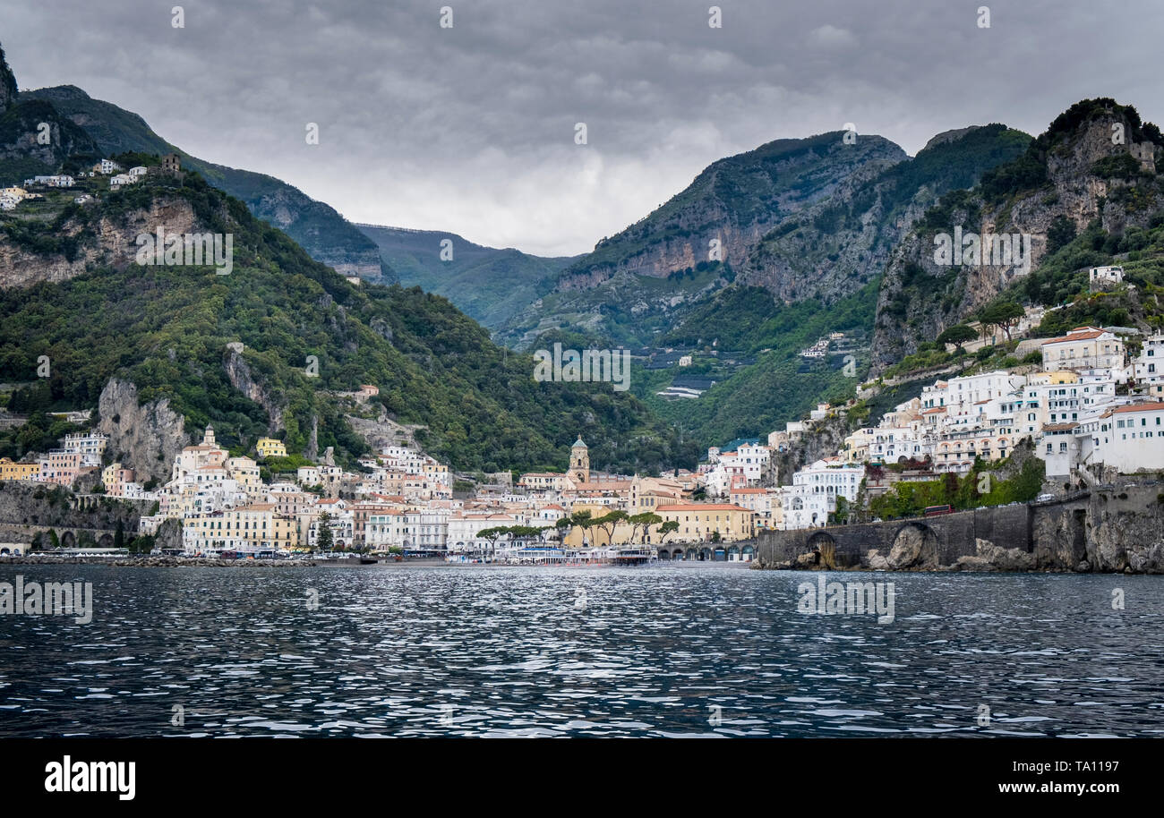 View of the coastal town of Amalfi and the hills of the Amalfi Coast in Campania Southern Italy  from the Bay of Salerno in the Tyrrhenian Sea Stock Photo