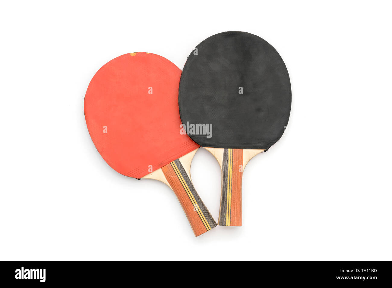 two old red and black table tennis rackets, isolated on white Stock