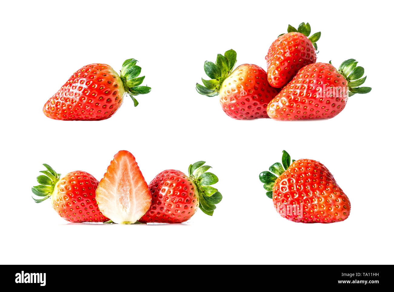 Set of fresh ripe red strawberries with green leaves close-up, isolated ...