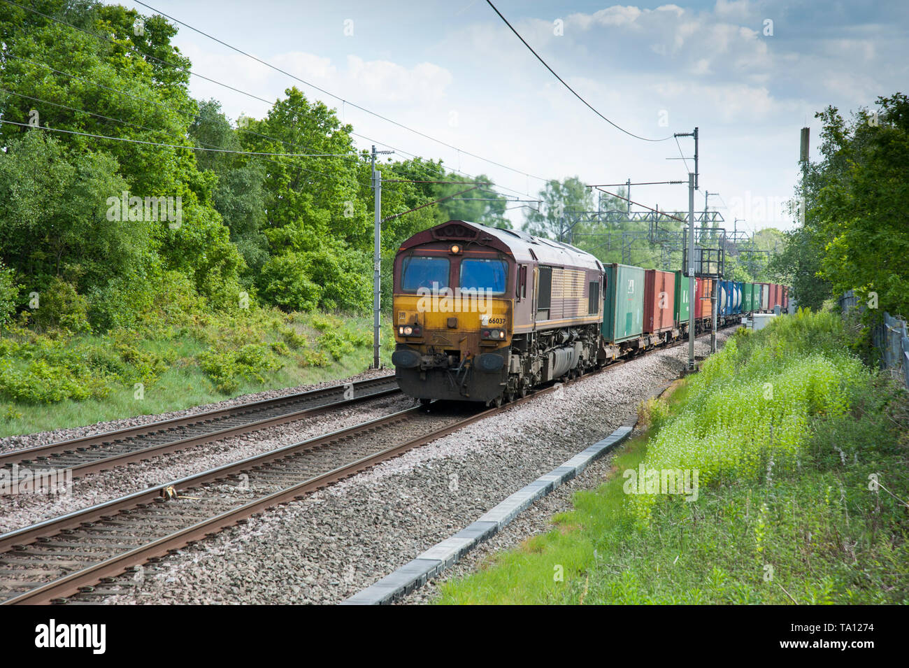Class 66 diesel locomotive hauling a freight  train Stock Photo