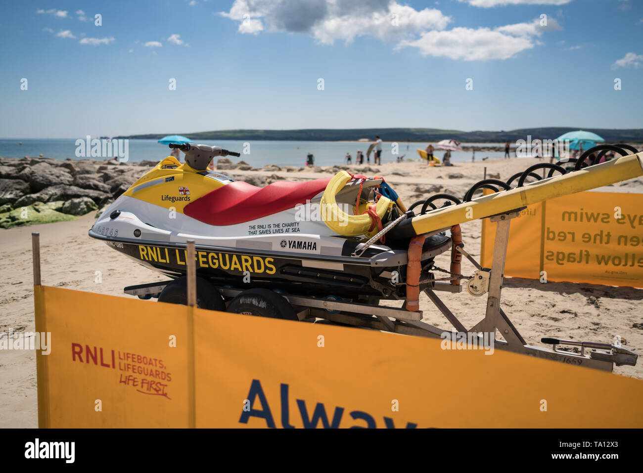 RNLI Lifeboat jet ski on trailer on the beach in Sandbanks Poole Stock