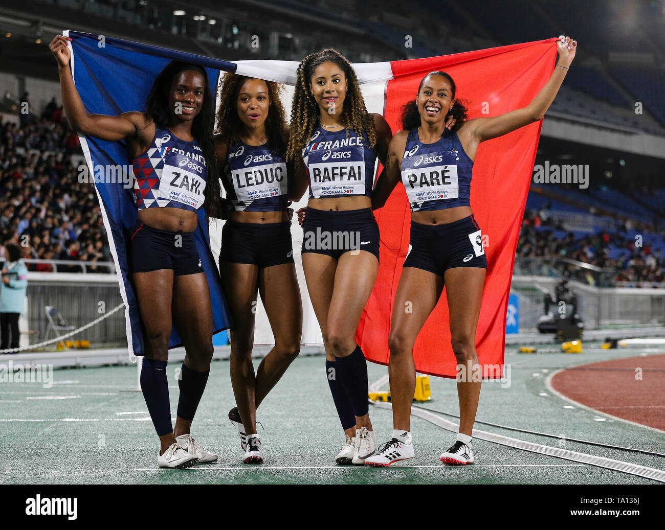 YOKOHAMA, JAPAN - MAY 12: Carolle Zahi, Cynthia Leduc, Estelle Raffai and Maroussia Paré of France after they the women's 4x200m final during Day 2 of the 2019 IAAF World Relay