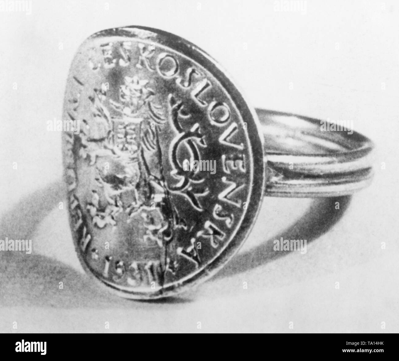 As a counterpart to the West Wall Ring, the Protectorate of Bohemia and Moravia had a Protectorate Ring. The ring has a 5-Heller coin at the front. Since March 1939, the areas of Bohemia and Moravia had been under German occupation. Stock Photo