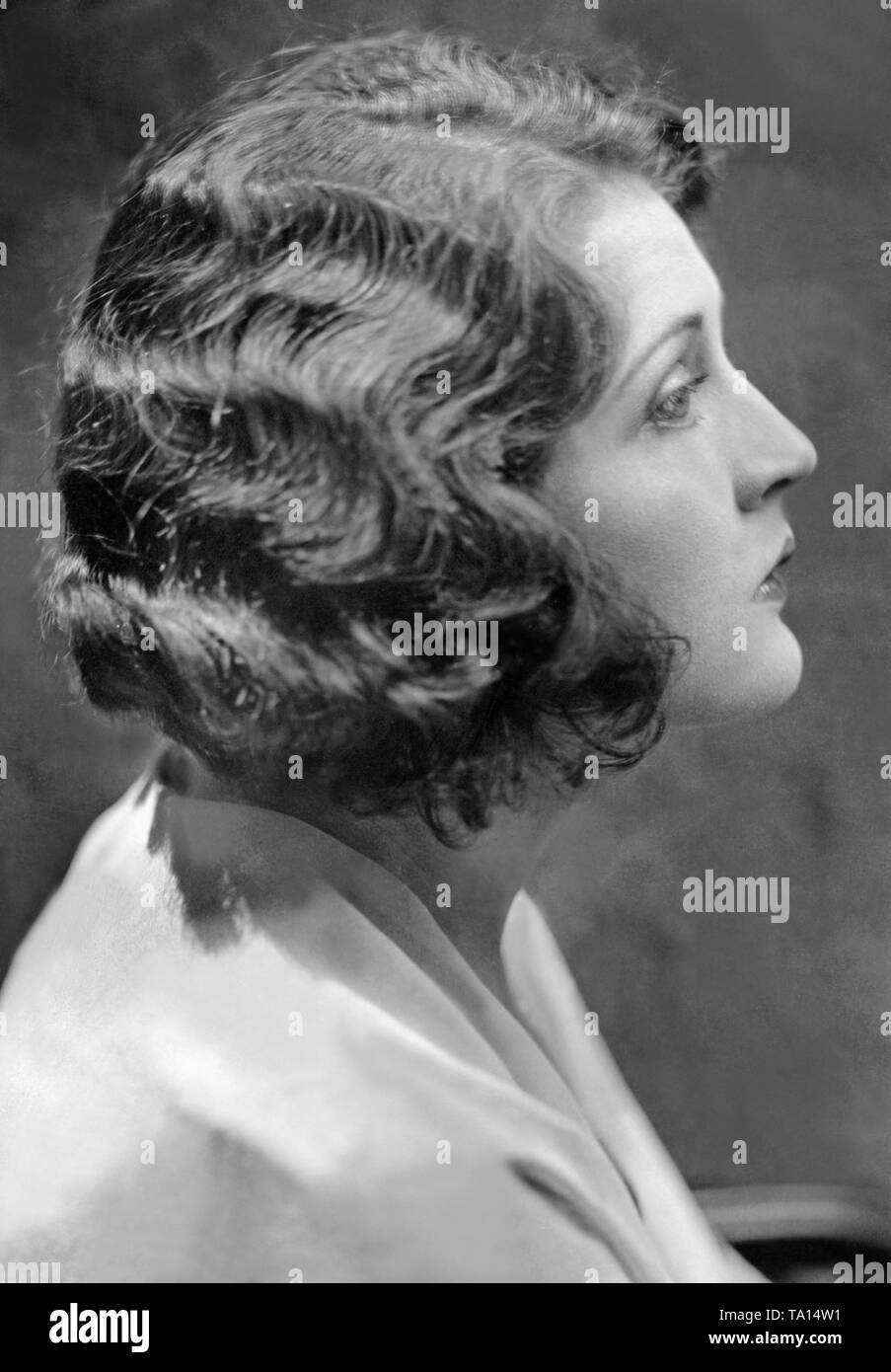 Portrait Of A Woman From The 1920s She Is Wearing Wavy Short