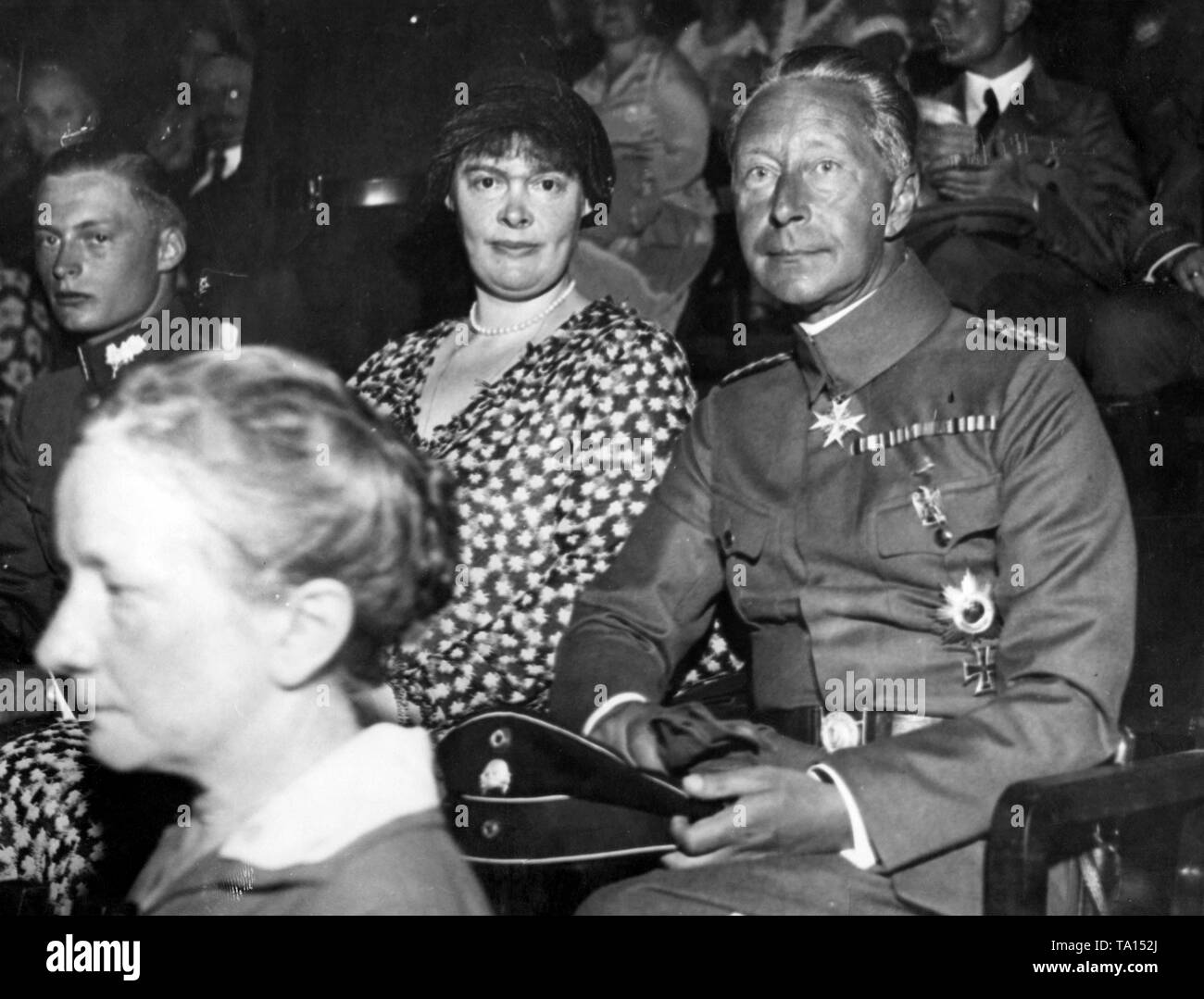 From left: Prince Wilhelm of Prussia, his mother Crown Princess Cecilie and his father Crown Prince Wilhelm of Prussia at a political event. Stock Photo
