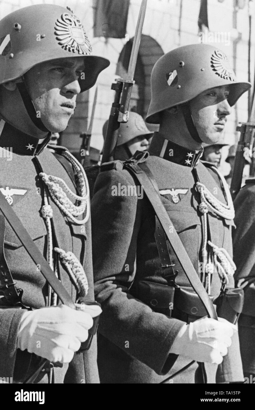 After the Anschluss of Austria to the German Reich, Austrian soldiers carry the German national insignia (Reichsadler). Stock Photo