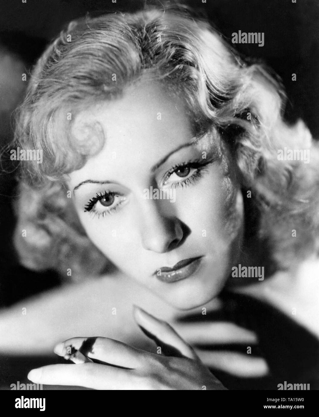 Woman with hairdo and make-up of the 1930s. Stock Photo