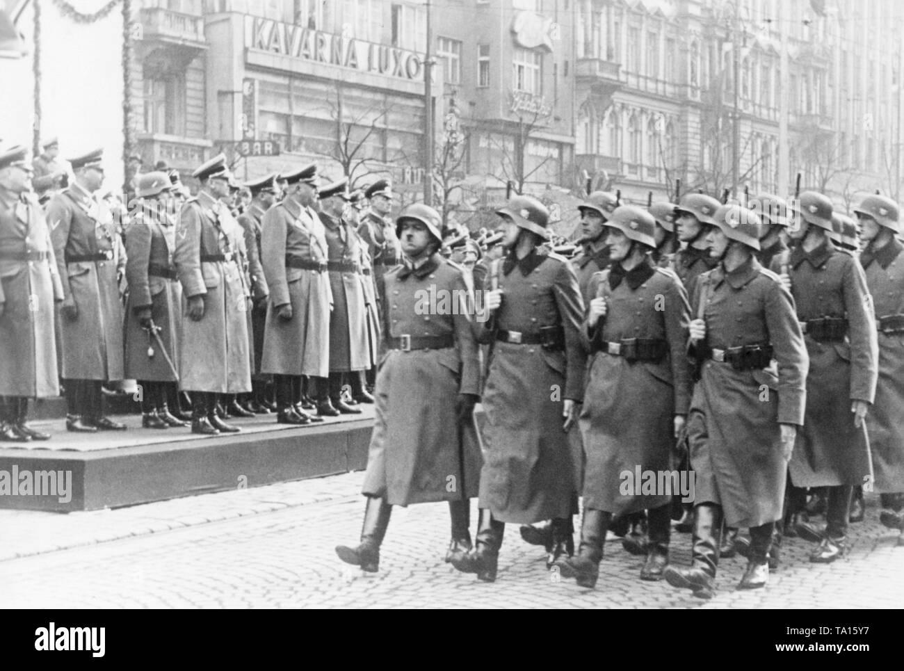 Military parade at Wenceslas Square on the occasion of the anniversary of the Protectorate of Bohemia and Moravia. The troops march past the Reich Protector of Bohemia and Moravia, Konstantin von Neurath. The first Slovak Republic was founded under Hitler's pressure in March 1939, and Bohemia and Moravia were occupied by the Wehrmacht. Stock Photo