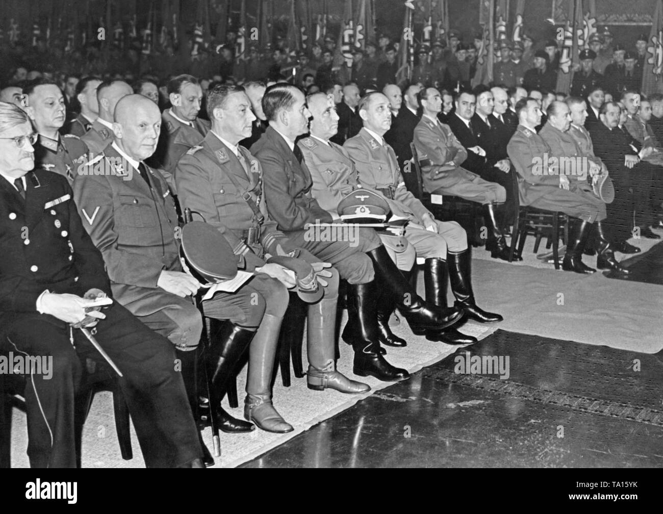 On the evening of January 29, 1943, the NSDAP leaders gathered at an event. First row from left to right: Otto Meissner, Hans Heinrich Lammers, Viktor Lutze, Albert Speer and Robert Ley. Stock Photo