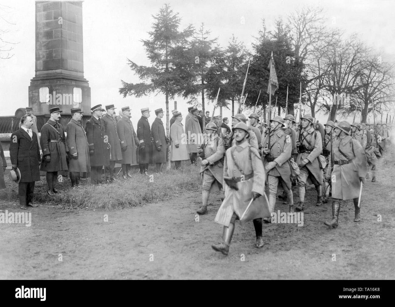 The last French troops leave the occupied Rhineland. Here, the soldiers parade one last time before the President of the Inter-Allied  Rhineland High Commission, Paul Tirard. Stock Photo